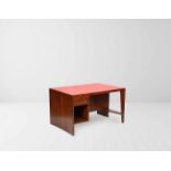 Pierre Jeanneret (1896-1967) Office table, 1957-58 Teakwood desk surfaced with red moleskin. Lateral