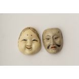 Netsuke mask, Japan, 20th centuryIvory, depicting a young woman's Noh mask. A small painted wood Noh