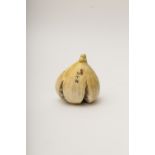 Fig-shaped okimono, Japan, Meiji periodCarved and coloured ivory, bearing a signature and a seal.