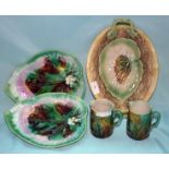 Mixed Lot Of 19thC Majolica To Include 2 Corn Decorated Cream Jugs, 2 Leaf Serving Dishes And A