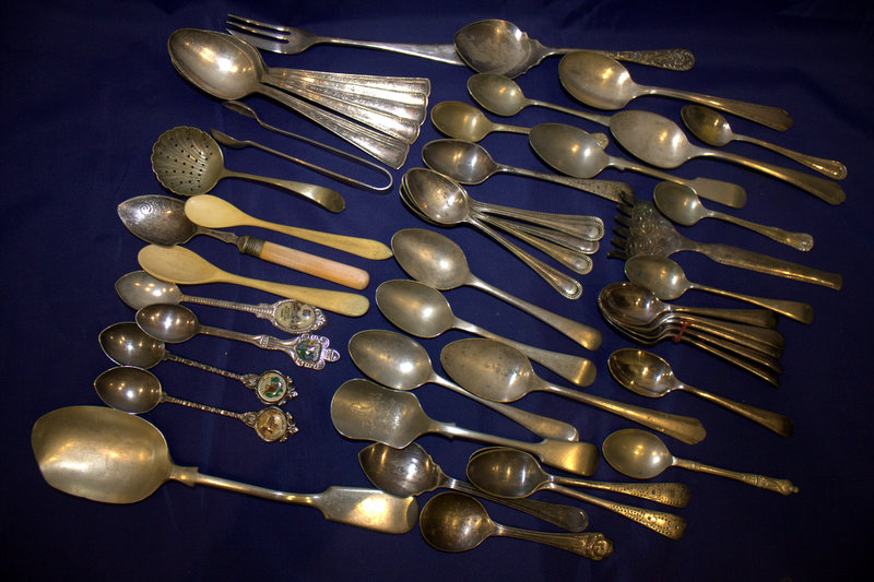 A Quantity Of EPNS Flatware, Souvenir Spoons, Sugar Nips, Strainer, Spoons, Forks, Bone Etc.