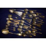 A Quantity Of EPNS Flatware, Souvenir Spoons, Sugar Nips, Strainer, Spoons, Forks, Bone Etc.