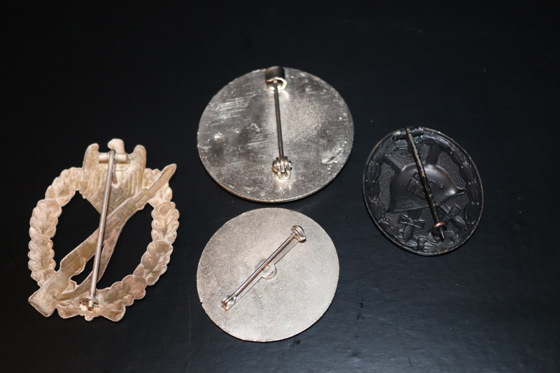 Collection Of Four German Nazi Badges, Probably Later Reproductions - Image 2 of 2