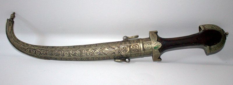 Middle Eastern Low Grade Silvered Metal Dagger And Scabbard, With Wooden Handle.