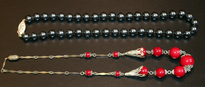 2 Strands Of Beads