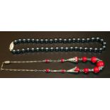 2 Strands Of Beads