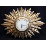 SMITHS SECTRIC STAR BURST WALL CLOCK, the dial with Arabic numerals