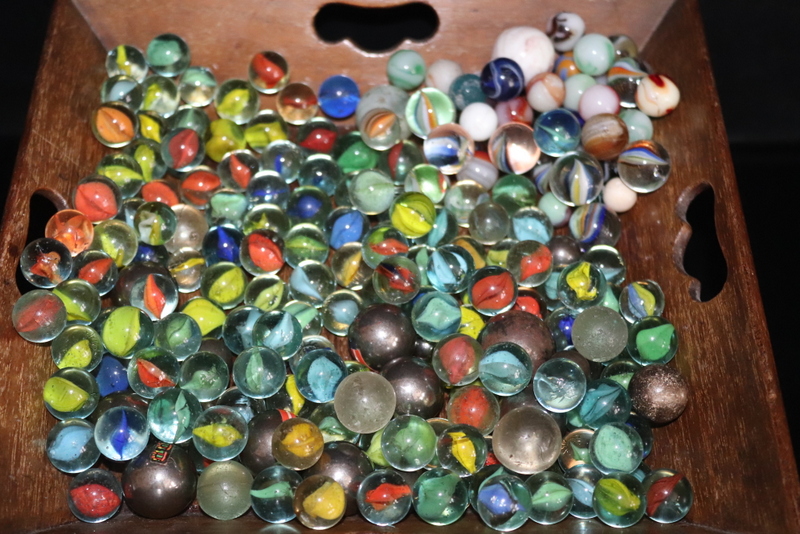 Large Bag Of Marbles Containing Smaller Bag Of Interesting Varieties