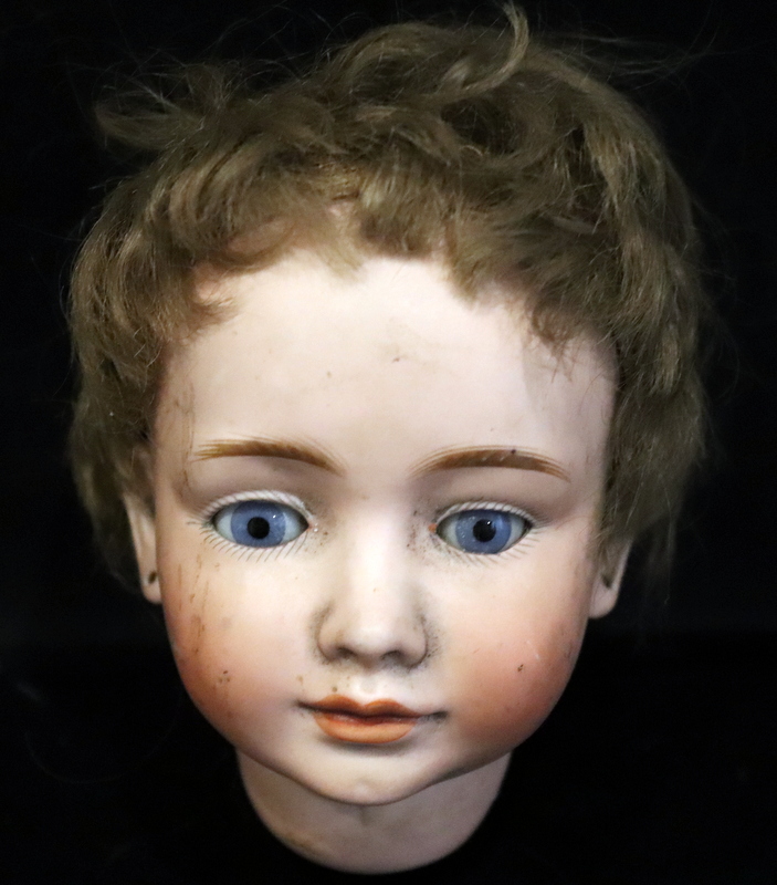 Bruno Schmidt German Bisque Dolls Head, With Blue Paper Weight Eyes, Stamped