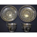 Two Indian Silvered Metal Cups And saucers