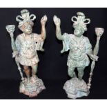 Pair Of Oriental Cast Iron Statues, Depicting Woman Carrying A Staff With