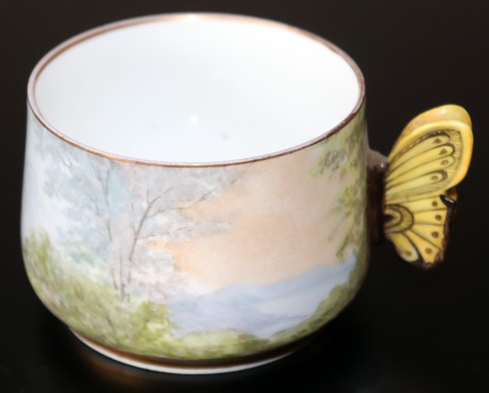 1884 French Exhibition Hand Painted Cup, With Continuous Landscape, Moulded Butterfly Handle, Marked