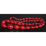 Strand Of Cherry Amber Graduating Beads, Length 28 Inches, Weight 58 Grams