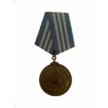 SOVIET NAKHIMOV MEDAL Nakhimov Medal, No. 2626. In brass. Medallion measures 36.1 mm in diameter