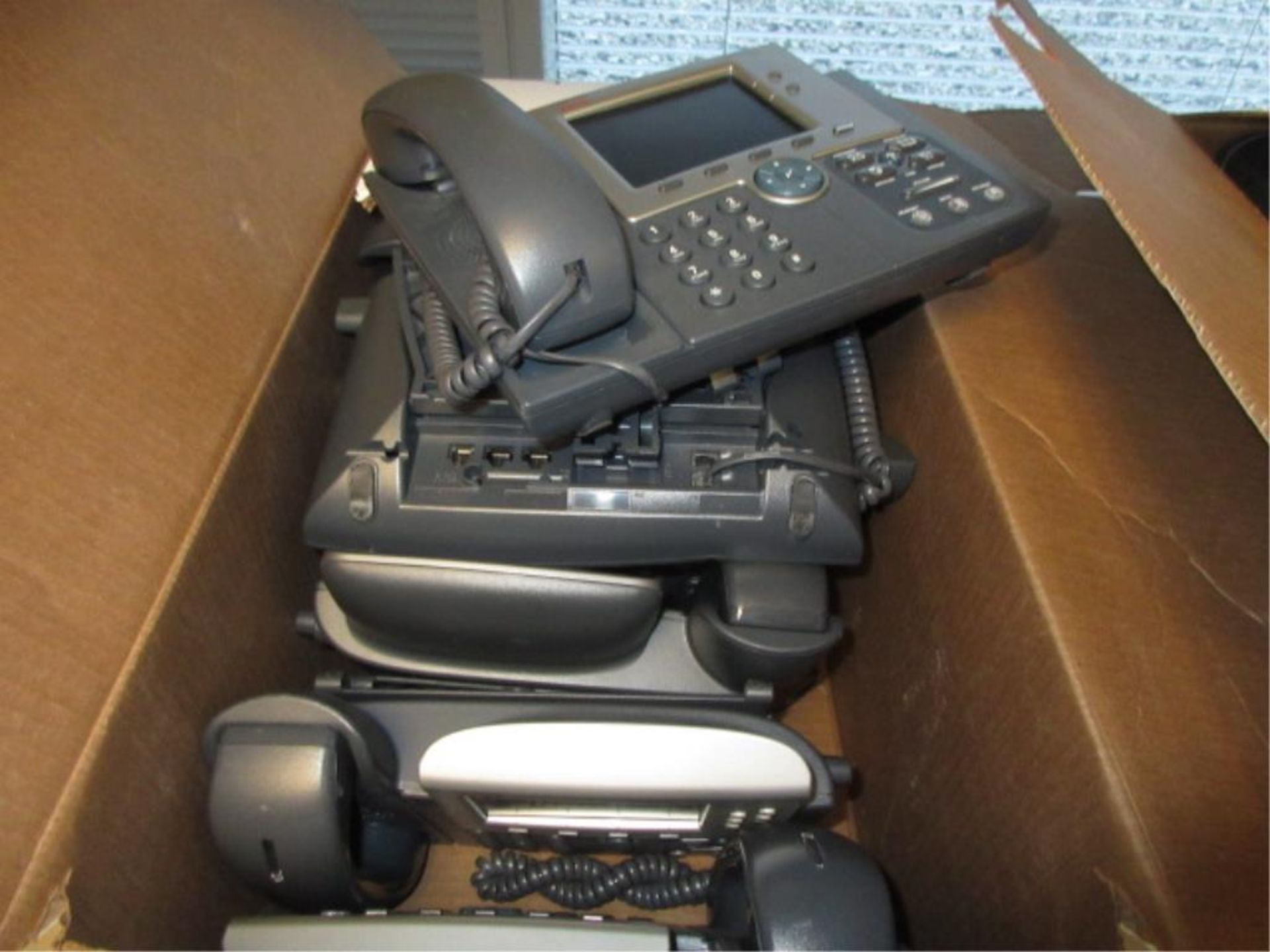 Cisco 7945 Lot of (10) IP Phone Sets, in one box. HIT# 2178982. Loc: W3.148. Asset Located at 1415