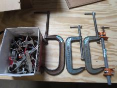 Assorted Clamps. Lot (3) C-Clamps, (1) Pipe Clamp, & Small box of Spring Clamps. Hit # 2203695.