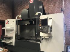 Haas VF-5 Vertical Machining Center. 52" x 23" table, 50"/26"/25", x/y/z travels, 50 taper geared