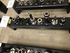 CAT 40 and CV 40 Taper Tool Holders. Rack of eight (8) assorted tool holders and tools. Main Bay.