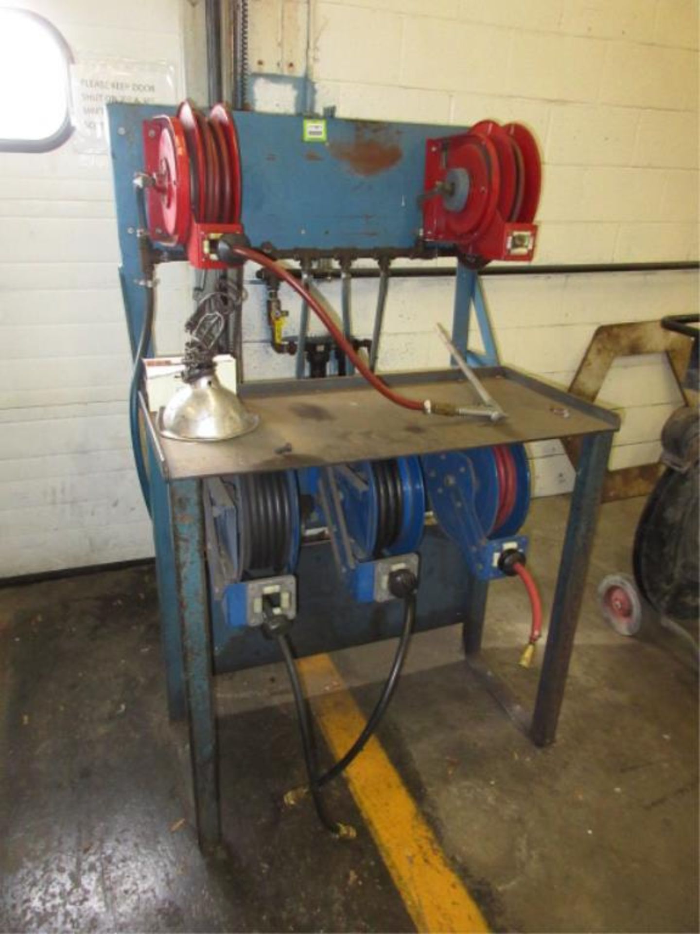 Hose Reel Stand. Air Hose Reel Stand, includes (5) retractable air reels. HIT# 2179021. Loc: main