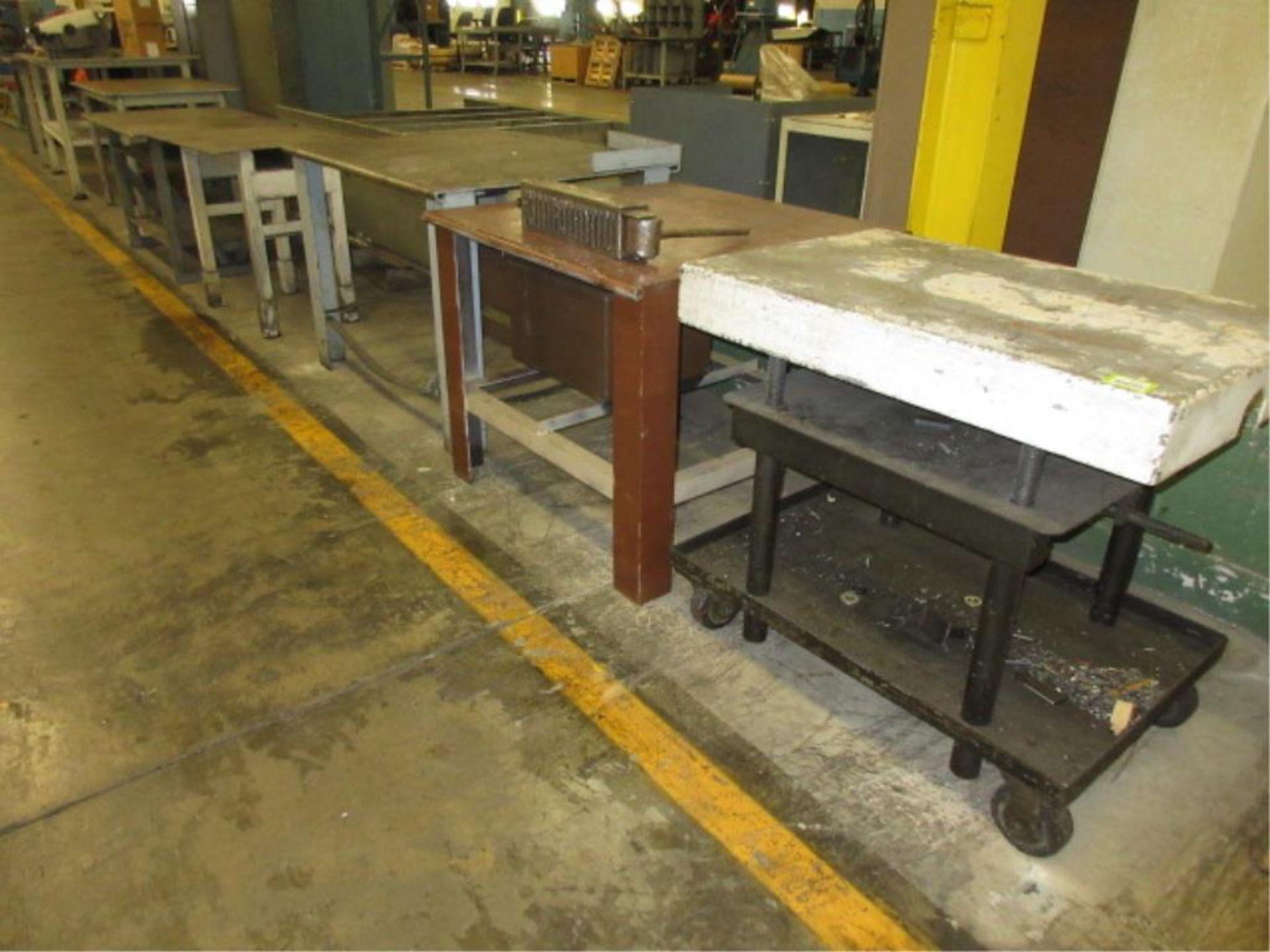 Shop Tables. Lot (7pcs) Heavy Duty Steel Shop Tables. HIT# 2179043. Loc: main floor. Asset Located
