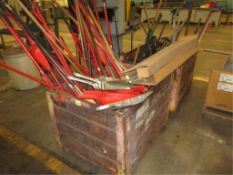 Brooms & Shovels. Assorted Brooms, Dust Pans & Shovels, in two bins. HIT# 2179075. Loc: main