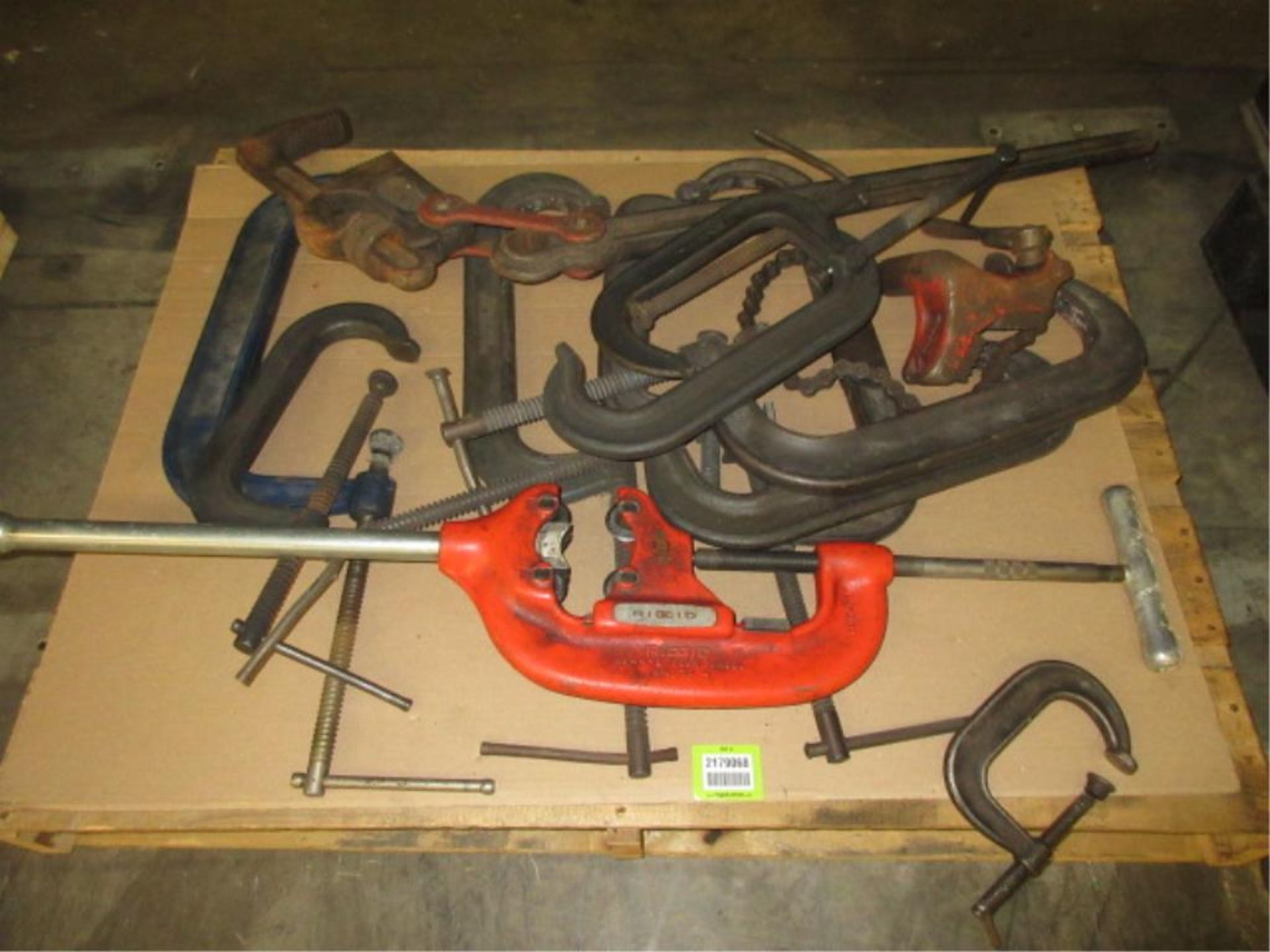 Shop Tools. Lot Shop Tools, includes: (1) Ridgid pipe cutter, (1) pipe wrench & (10) assorted C-