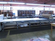 Fabric Cutting Table with Rollers. Fabric Cutting Table (47' x 67"W) with (2) Mobile Fabric Rollers,