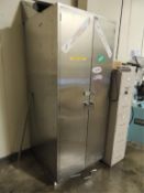 Cabinets; Two door SS storage cabinet and contents, cutting shield, gauge, empty tool cases, five