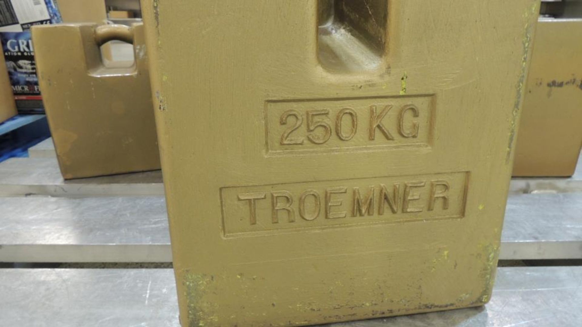 Troemner Calibration weights; Aluminum pallet and contents, (3) 250kg, (2) 100kg. HIT# 2226628. Loc: - Image 2 of 3