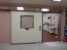 Clean Seal Automatic Opening Single Slide doors; Lot (2) 92"w x 99" h. HIT# 2225980. Loc: 3702-2,