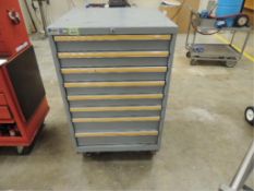 Lista Cabinet; eight drawer parts cabinet on casters includes contents. HIT# 2192359. Loc: 2501-1.