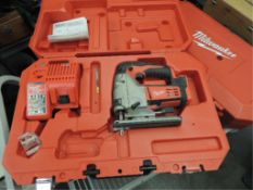 Milwaukee M18 Saw; cordless jig saw with charger NO batteries, 18v. HIT# 2192439. Loc: 901 cage.