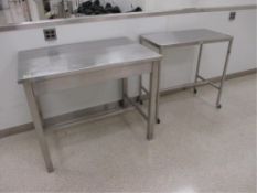 Tables; Lot: (2) Stainless Steel Tables [one on wheels]. HIT# 2223123. Loc: 2506-1 Asset Located at