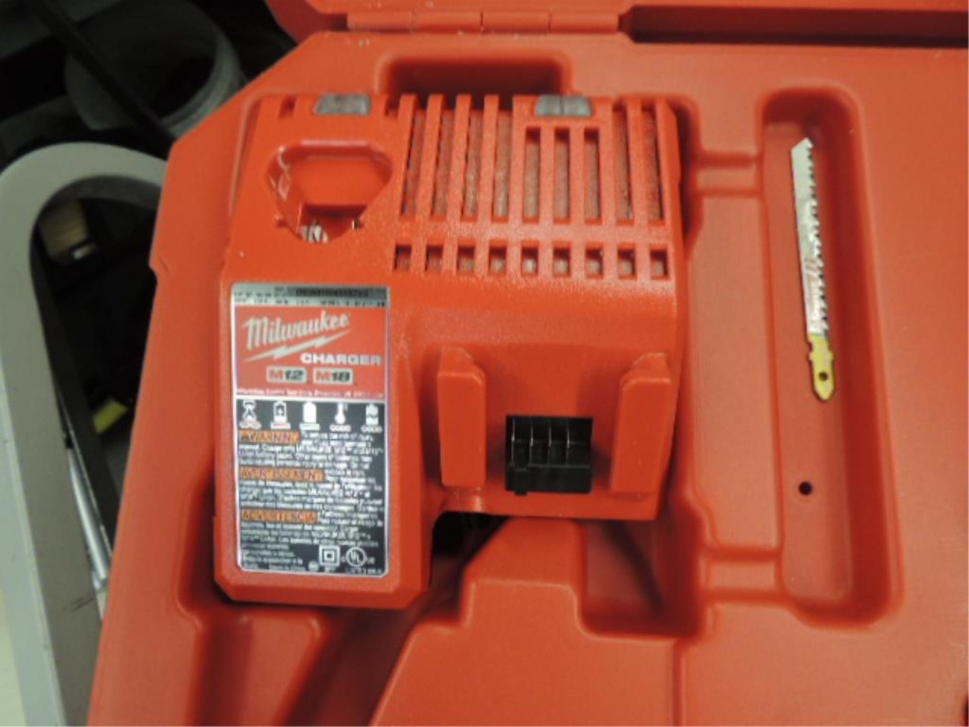 Milwaukee M18 Saw; cordless jig saw with charger NO batteries, 18v. HIT# 2192439. Loc: 901 cage. - Image 3 of 5