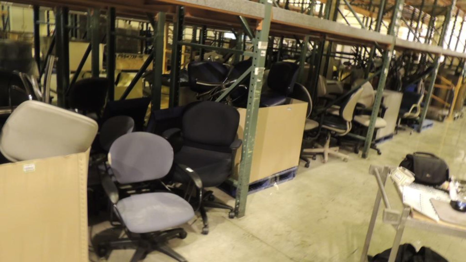 Chairs; Lot: approximately (28)office chairs and one metal desk. HIT# 2192727. Loc: 2101. Asset
