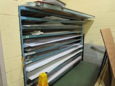 Rack & Contents; 101"w x 43"d x 71'h with assorted plastic material. HIT# 2123546. Loc: 1110-1