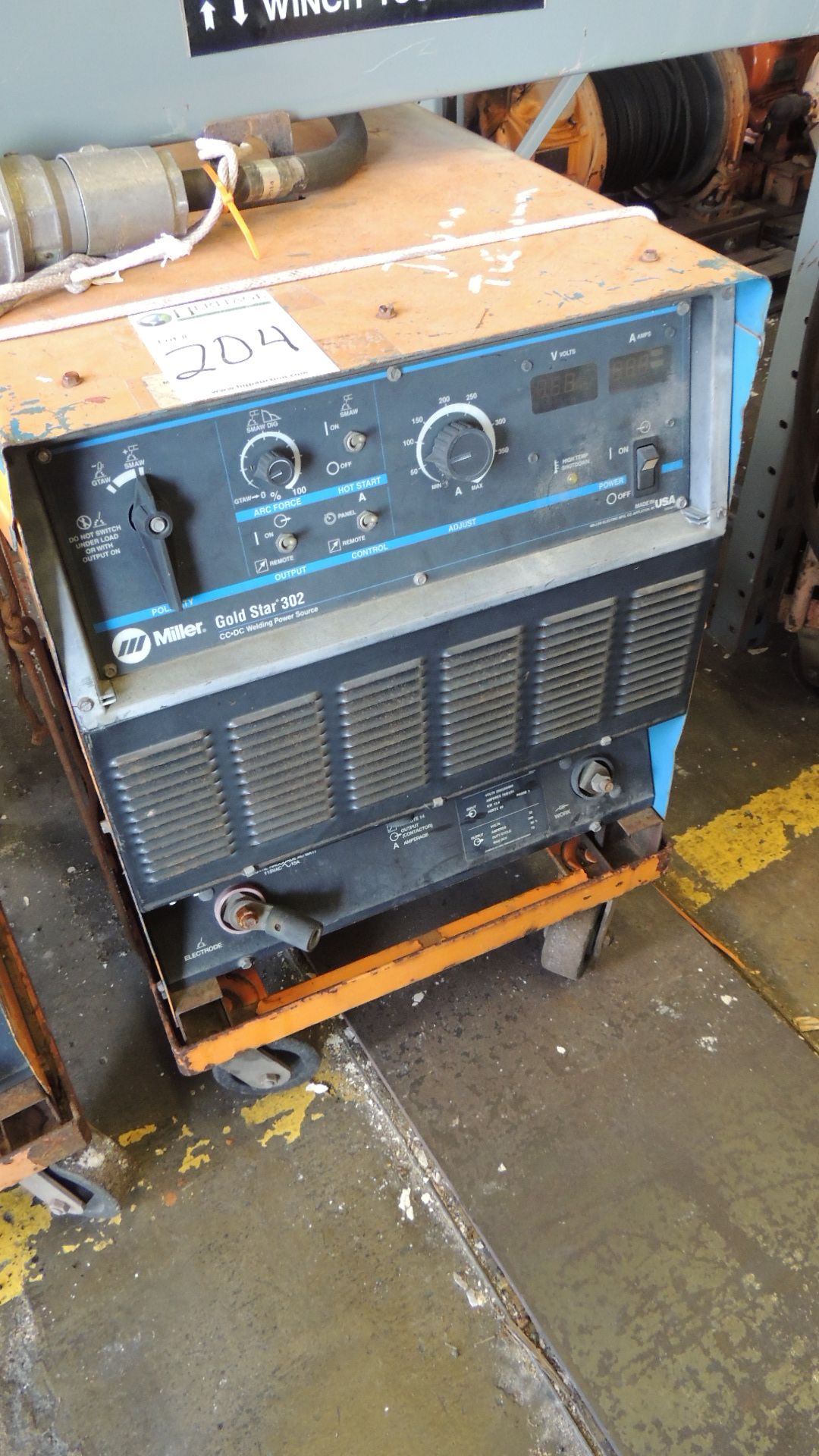 Welder. Miller Gold Star 302 CC.DC welding power source, on casters, volts and amps digital readout,