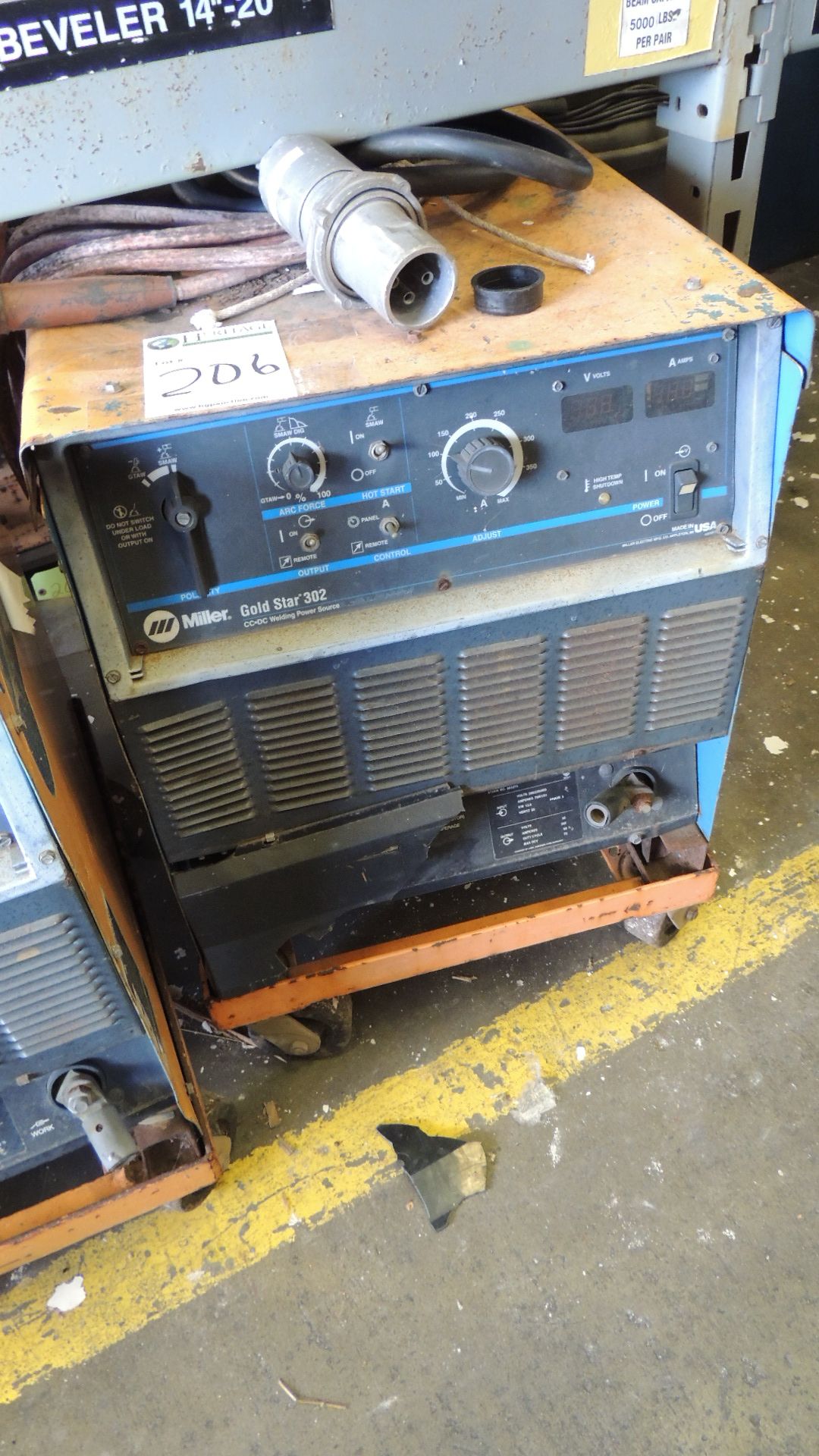 Welder. Miller Gold Star 302 CC.DC welding power source, on casters, volts and amps digital readout,