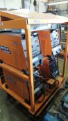 Welders. Lincoln Flextec 450 (4) welders in rack, on casters, 230/460v, w/ Miller rack four pack.