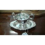 IRISH SILVER PLAIN CIRCULAR TWO HANDLED RIMMED TROPHY CUP