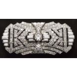 Brooch 1930’s - Platinum set with diamonds brilliants-cut and baguette-cut. [...]