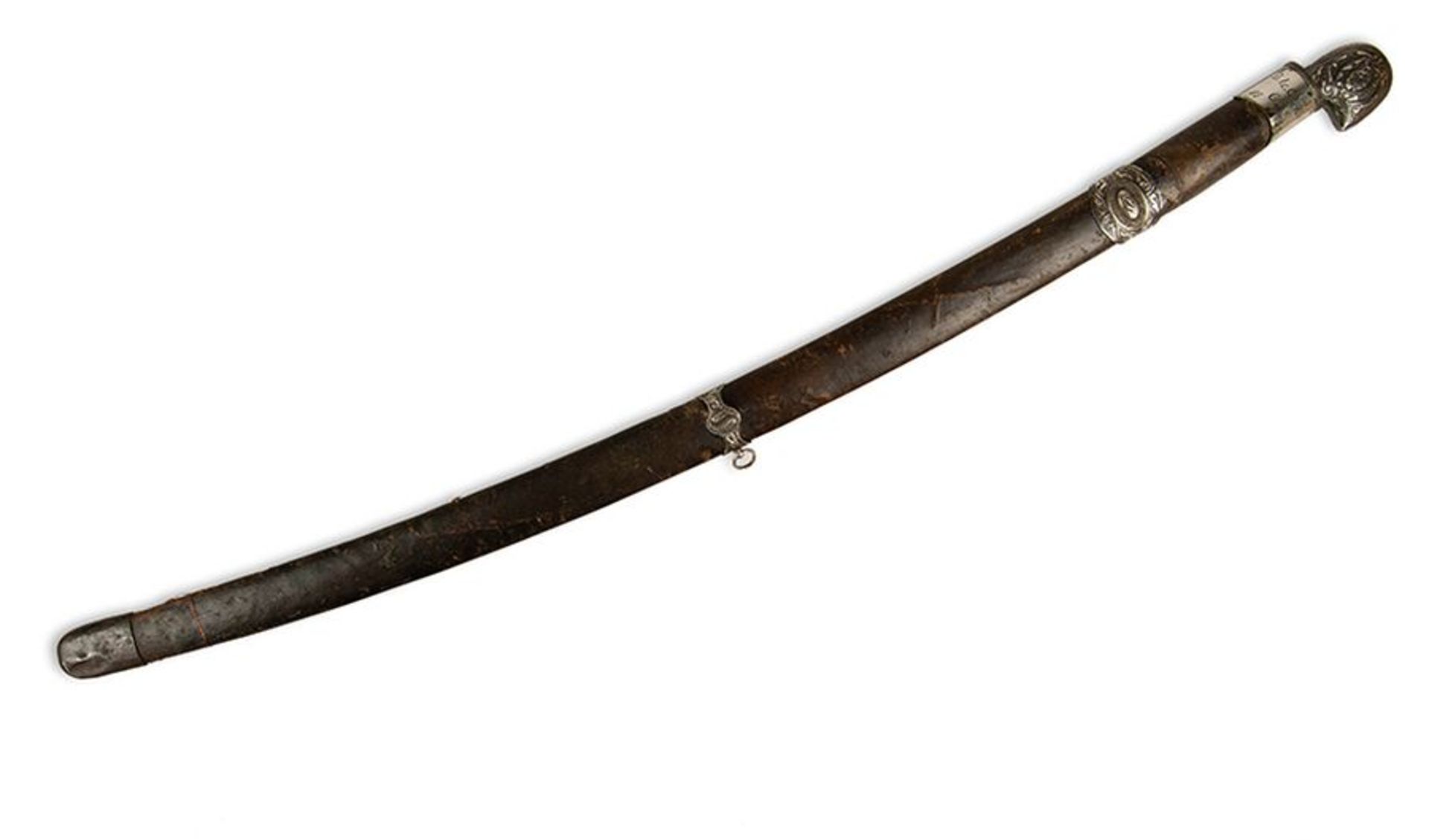 A Caucasian silver shashka with Polish blade. Curved, the silver-mounted hilt with [...]