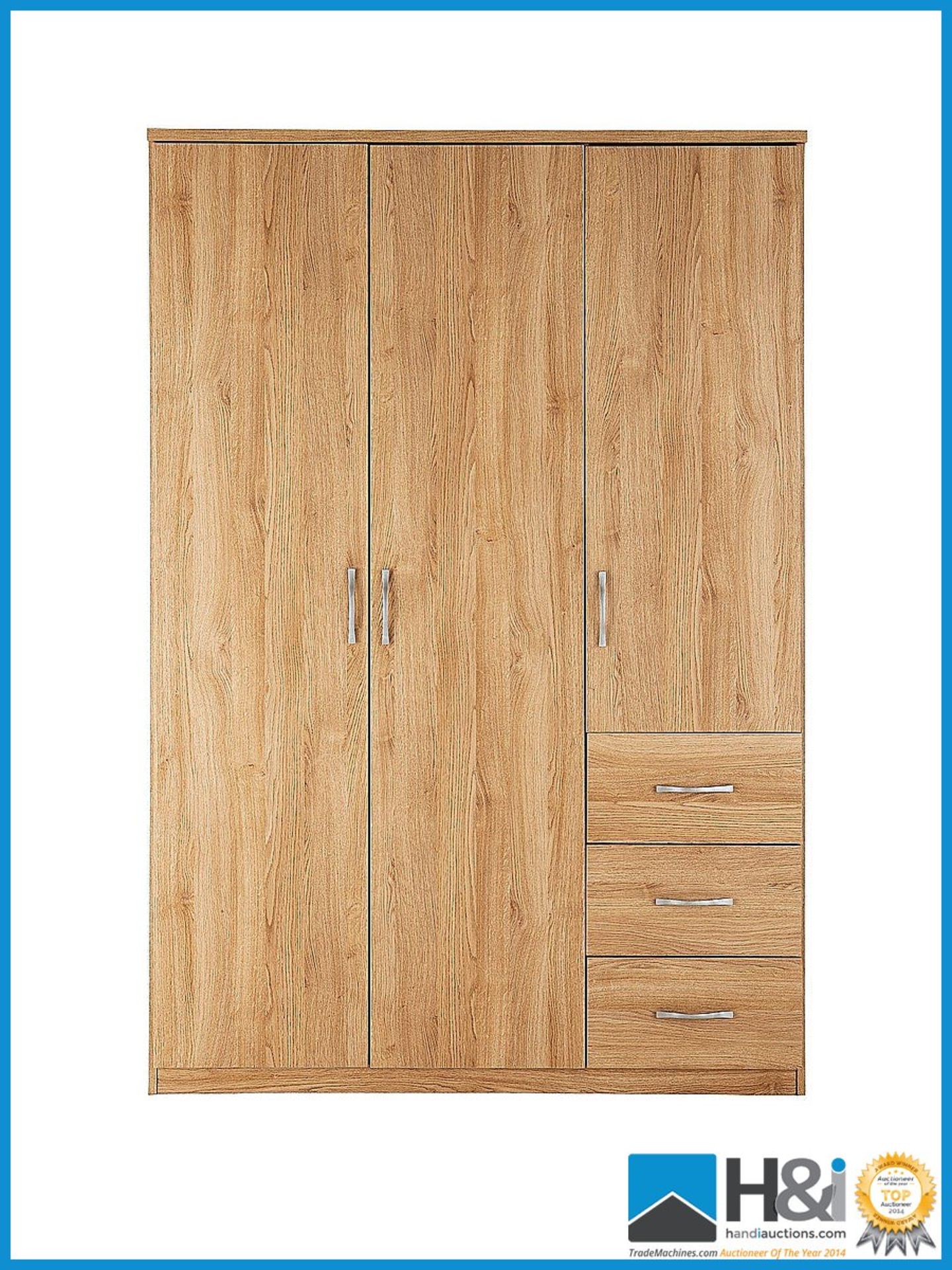 NEW IN BOX PERU 3DOOR 3DRAWER WARDROBE [OAK] 182 x 120 x 52cm RRP £324 Appraisal: New, unused in