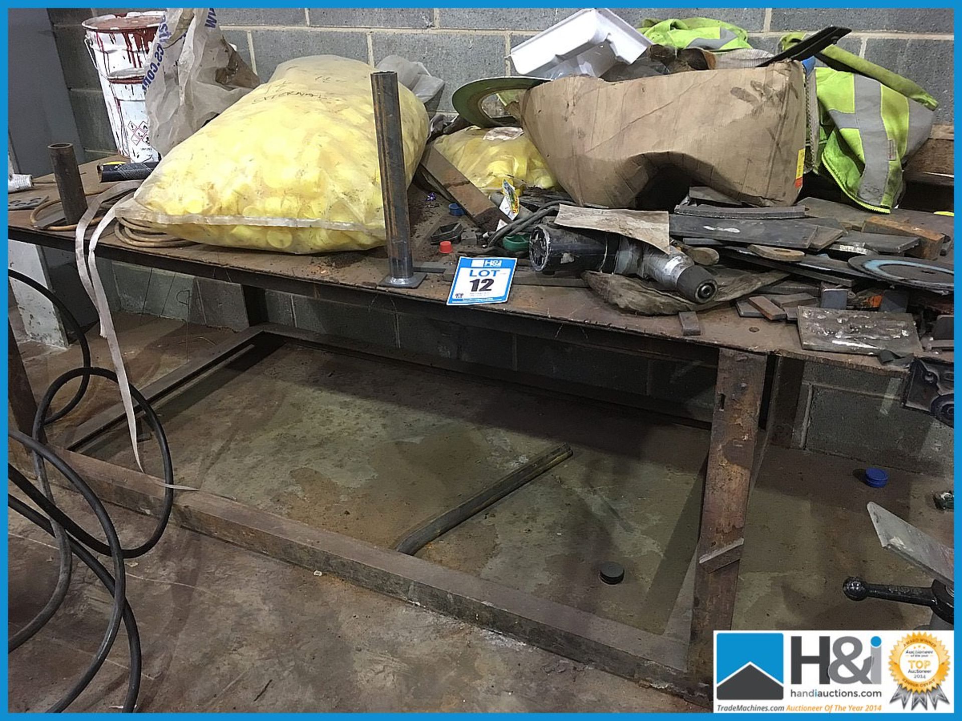 Fabricated metal welding table. No VAT on this lot except on the buyers premium Appraisal: Viewing