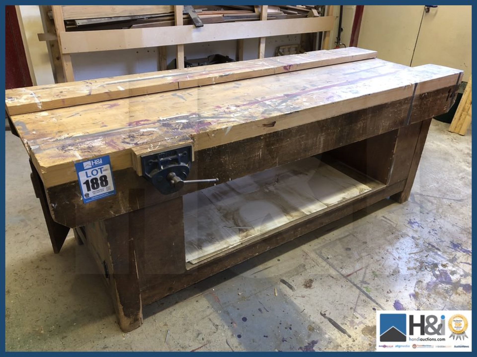 Wooden joiners bench with two record vices 90" x 32" with two end cupboards.