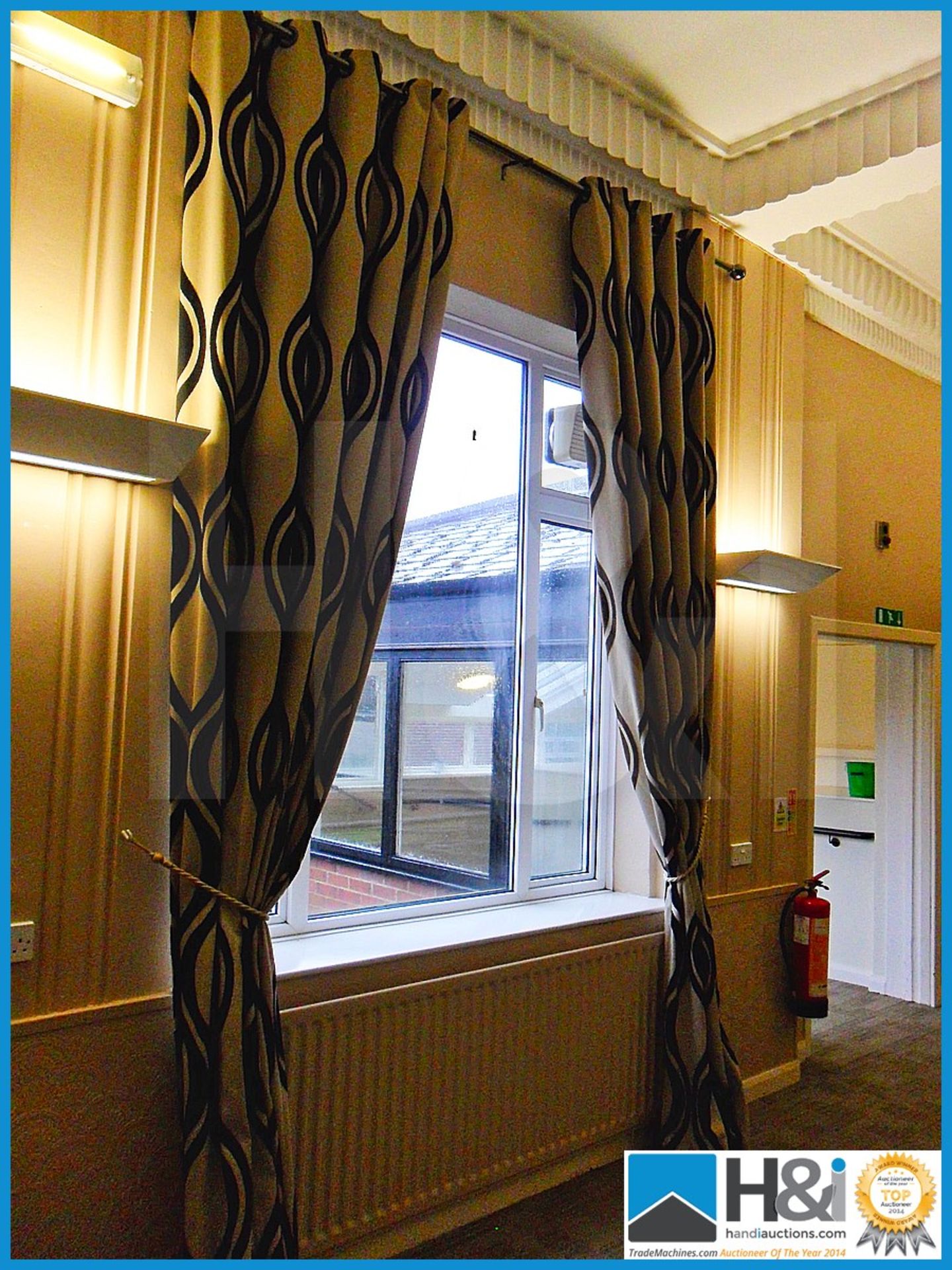 Double lined curtains, overall width 2.2m X 3.5m drop. Also come with curtain rail, tie backs and fi