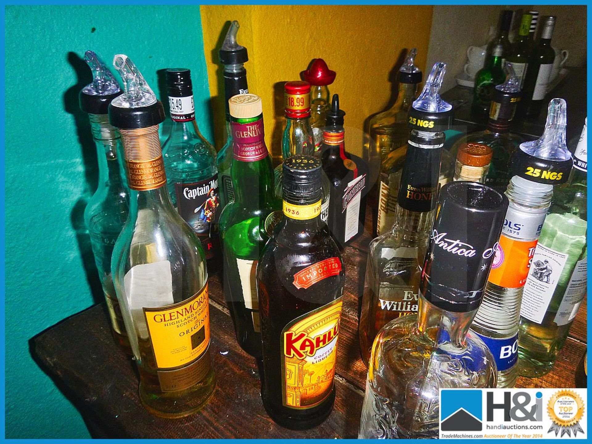 Good mixed lot of part bottles of spirits, WKD and stack of new drinks coasters - Image 4 of 4