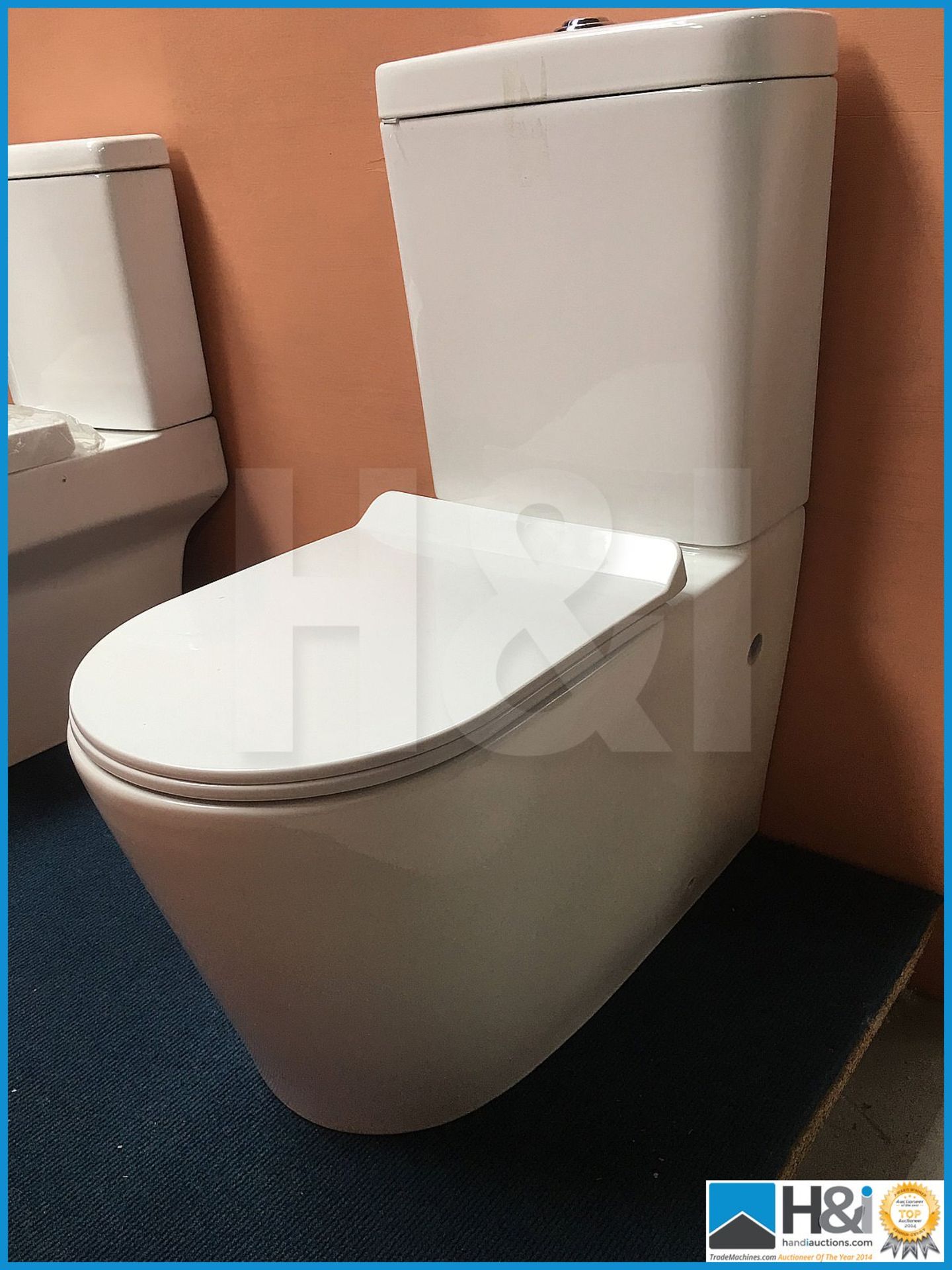 Designer K008 full fascia WC with complimenting thin sandwich soft close seat compete with valve mec