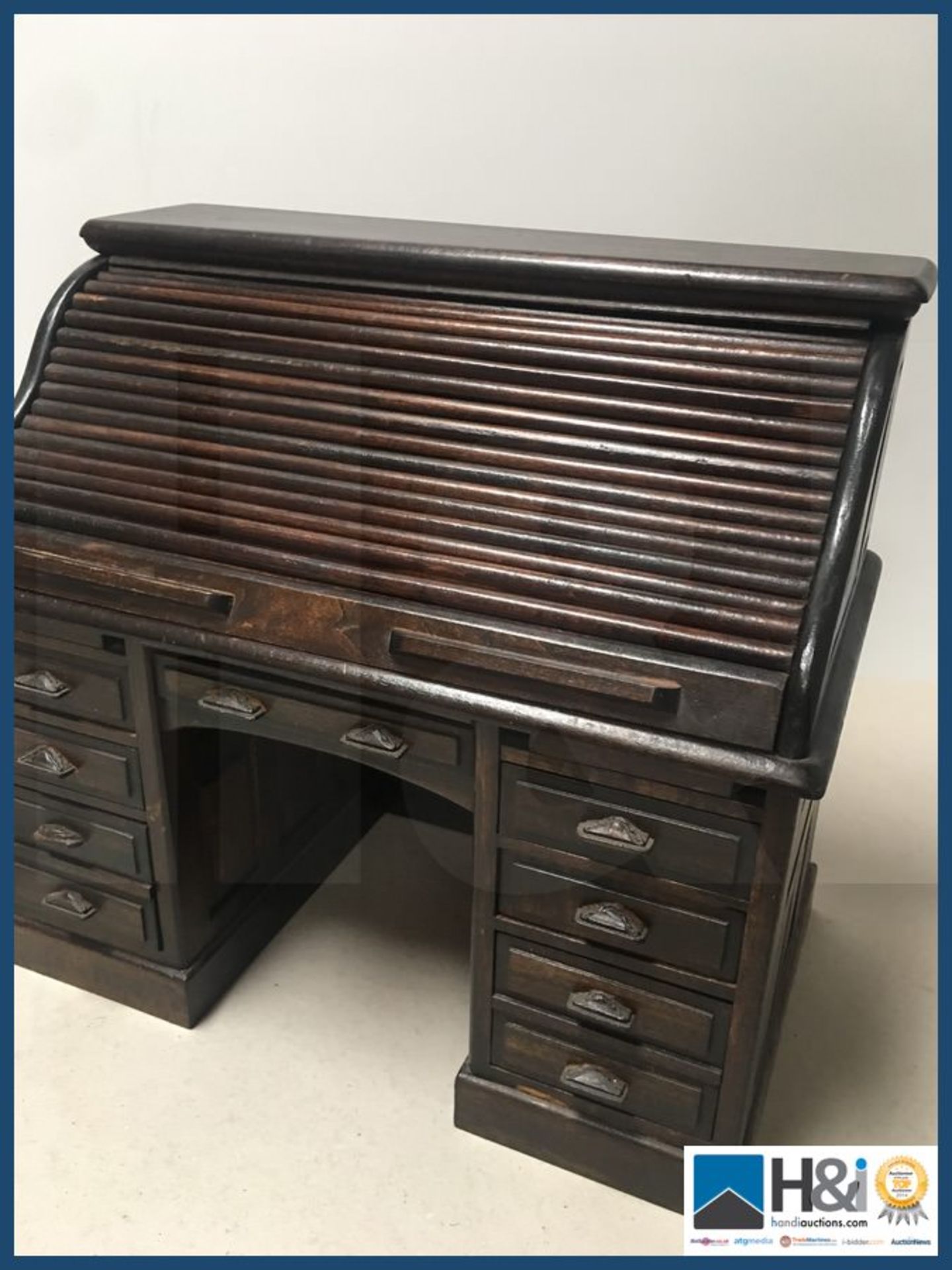 Minature roll top oak desk with all working drawers 14" wide x 8" deep x 13" high. - Image 2 of 4