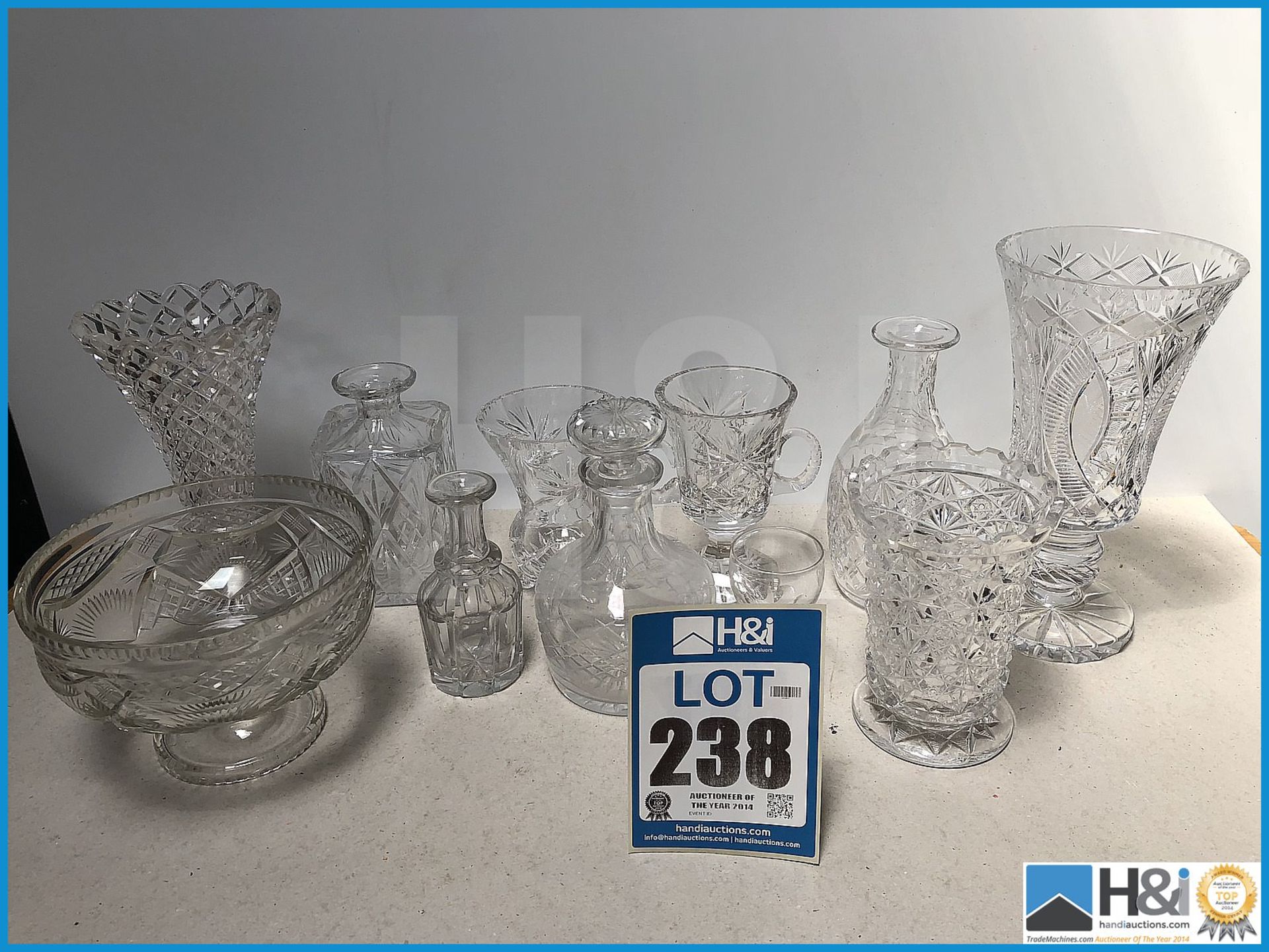 Good lot of cut glass decanters and other glassware.